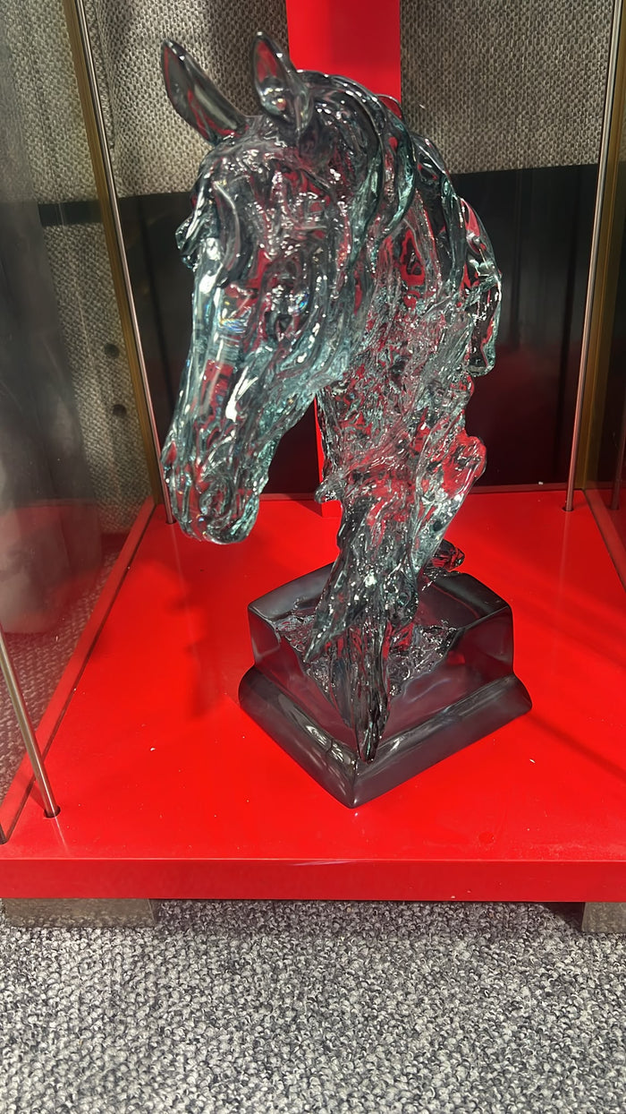 Glass horse head sculpture on red display stand, modern home decor accent piece