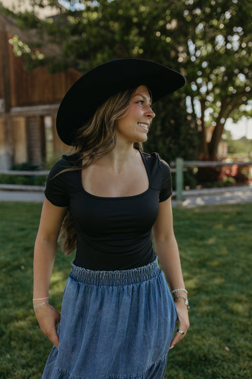 THE GISELLE BODYSUIT IN BLACK