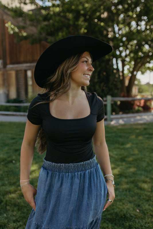 THE GISELLE BODYSUIT IN BLACK