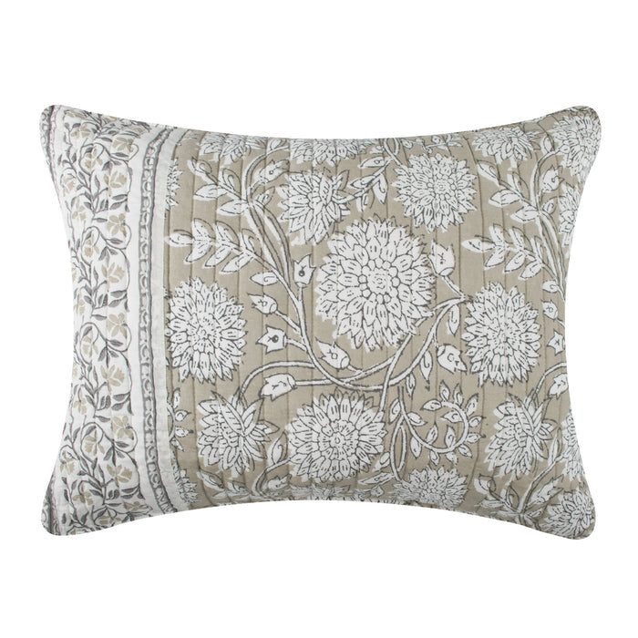 Floral patterned pillow with white flowers on a beige background
