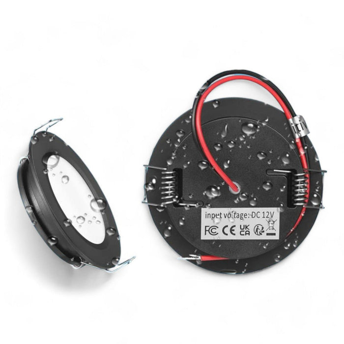 group of black cool LED downlights displayed simply