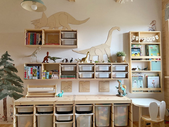 Assembled triceratops wooden wall art displayed above playroom storage shelves and toy organization