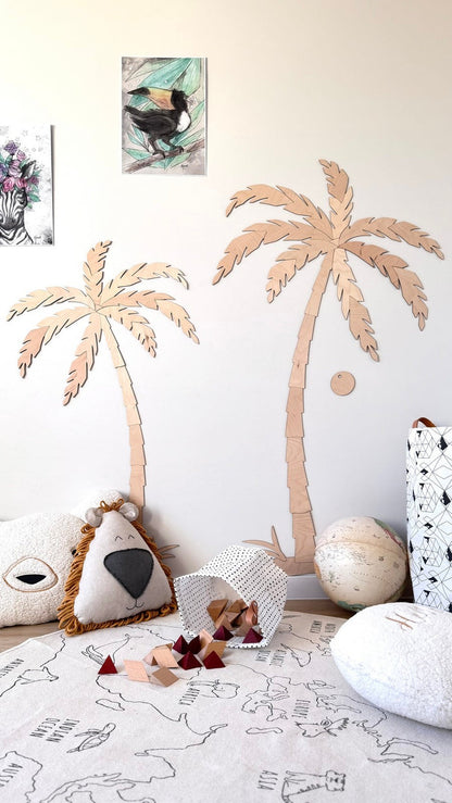 Complete room view showing wooden palm tree set installed above nursery play area