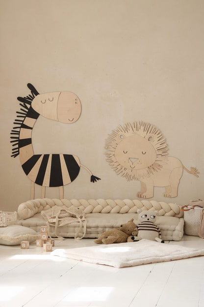Zebra and lion wooden wall decals displayed together in neutral nursery setting