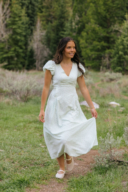 THE ANNABELLE DITSY FLORAL FLUTTER SLEEVE DRESS