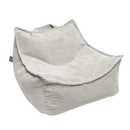 Ecru velvet bean bag with ribbed texture and soft molded shape for toddler seating