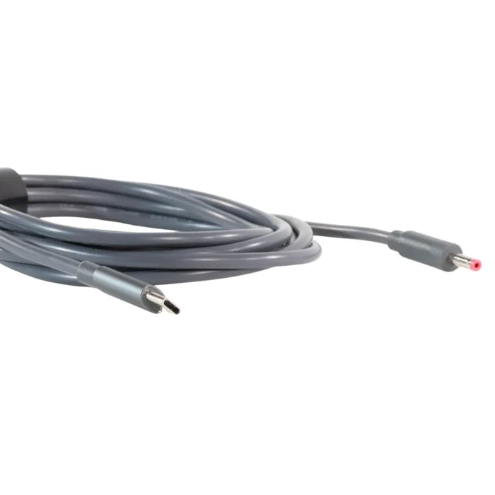 mini router USB-C power cable coiled beside accessories
