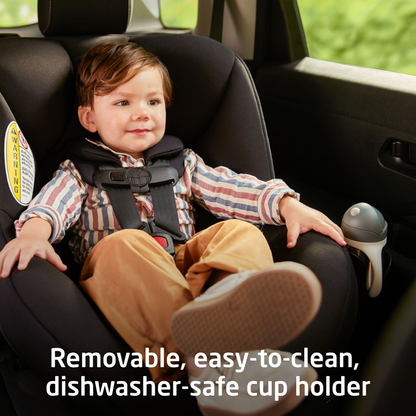 Child in a car seat with a cup holder in a vehicle interior