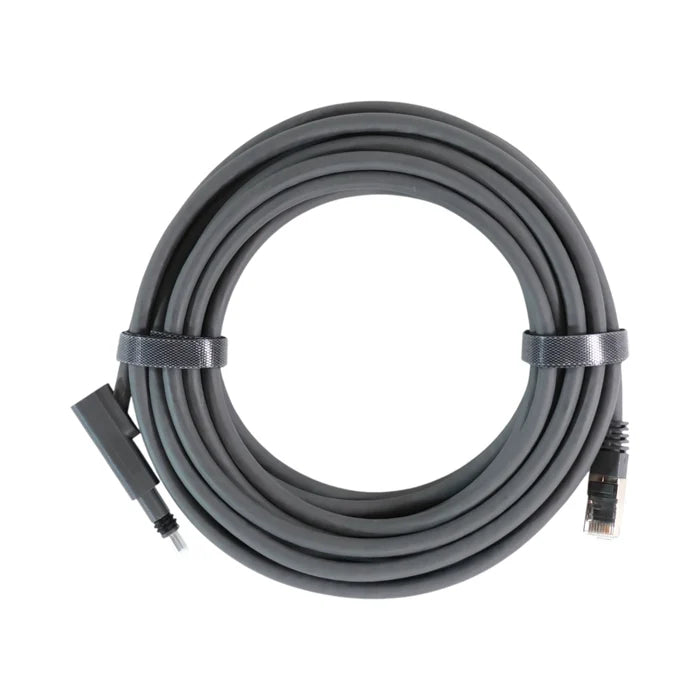 Starlink Gen 2 SPX to RJ45 20ft adapter cable coiled on table