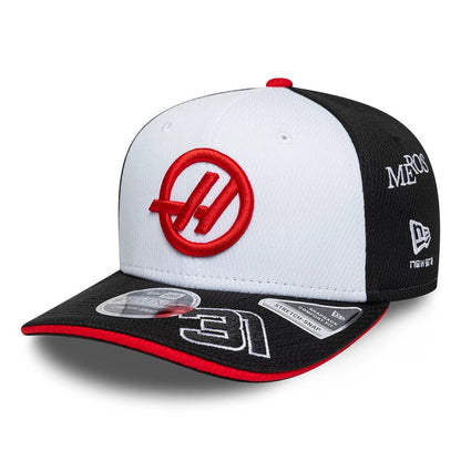 Pictured is this Esteban Ocon TGR Haas F1 9SEVENTY Stretch Snap cap in black. 1